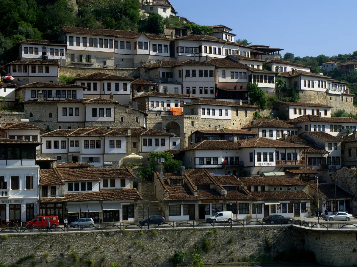 Berat's Ottoman-era houses stacked on the hillside above the river