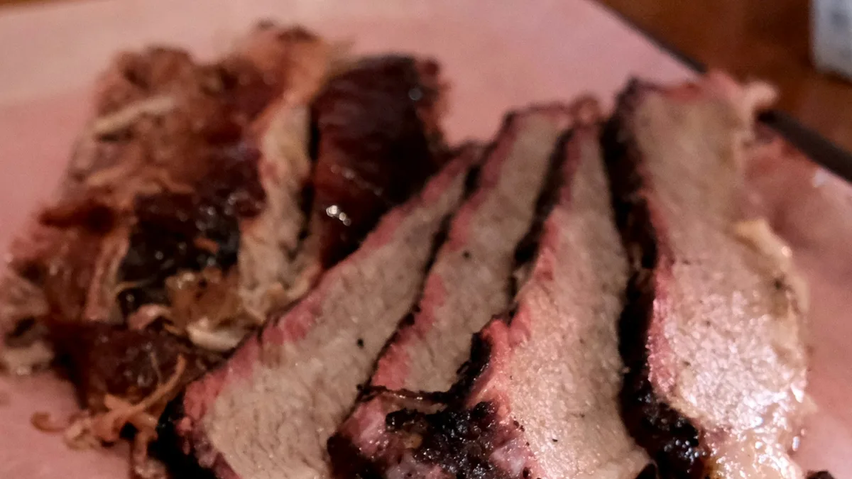 Sliced Texas-style smoked brisket on butcher paper