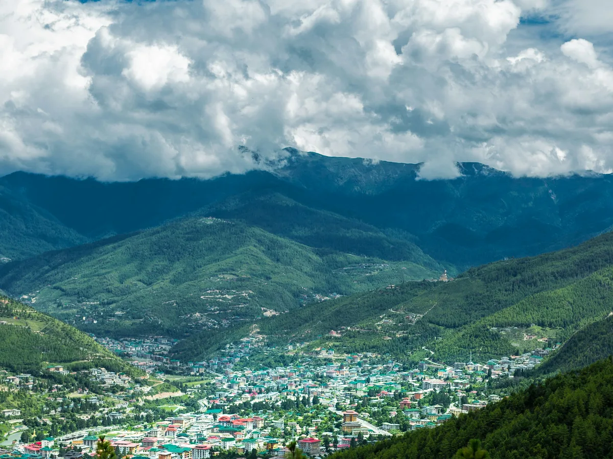 A scenic view of Thimphu city set among Bhutan's mountains