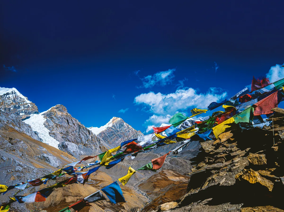 Snow-capped Himalayan peak under a clear sky in Nepal