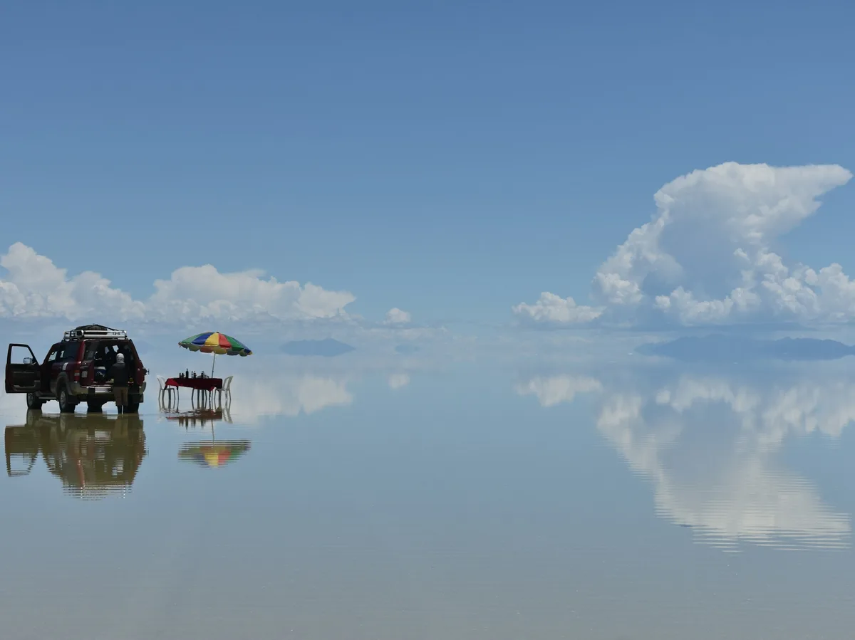 Boats resting on the still waters of Lake Titicaca, high in the Andes