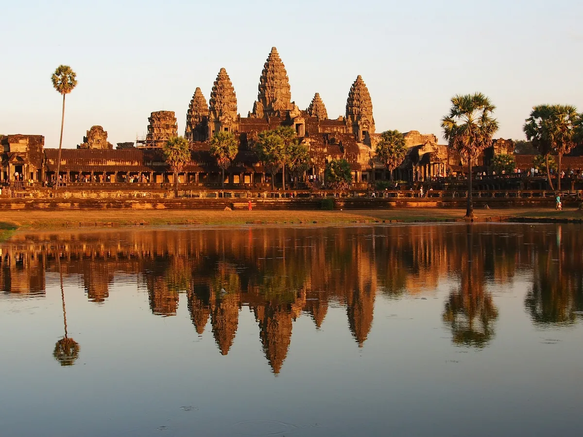 Close-up carved stone face at Angkor Wat temple complex in Cambodia