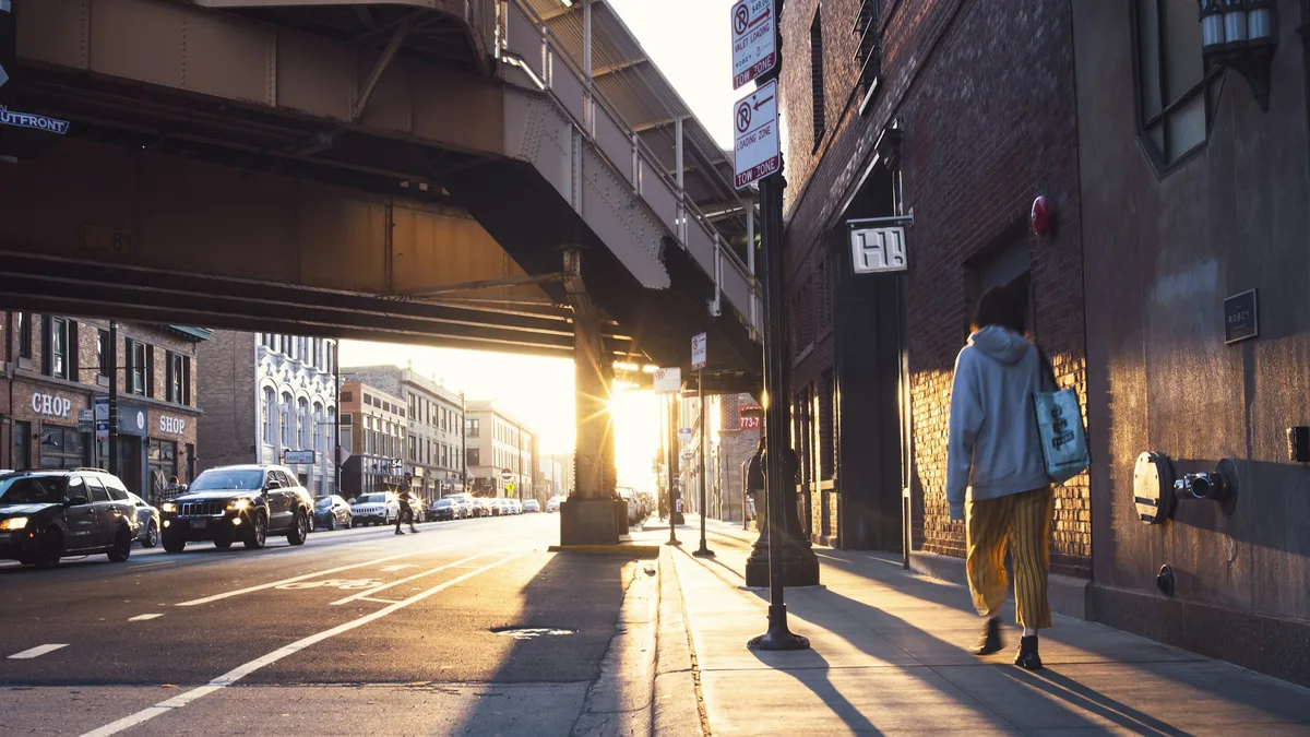 A trendy neighborhood street lined with boutiques and cafes