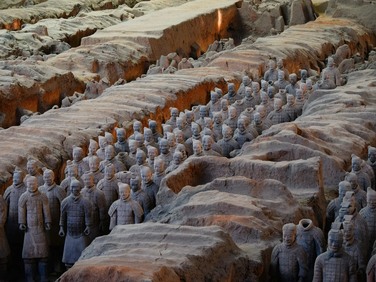 Rows of Terracotta Army soldier statues in the excavation pits near Xi'an