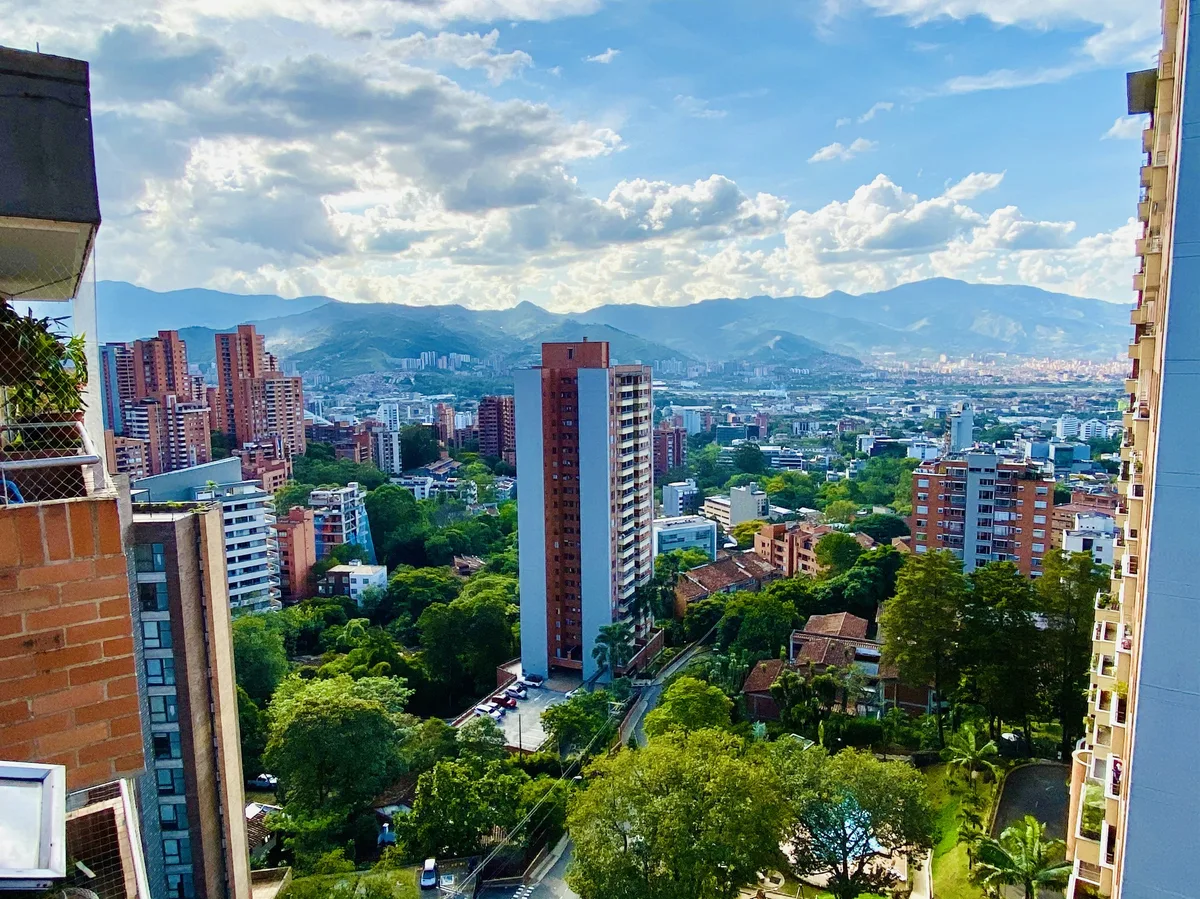 Medellín's skyline set against the surrounding Andean mountains