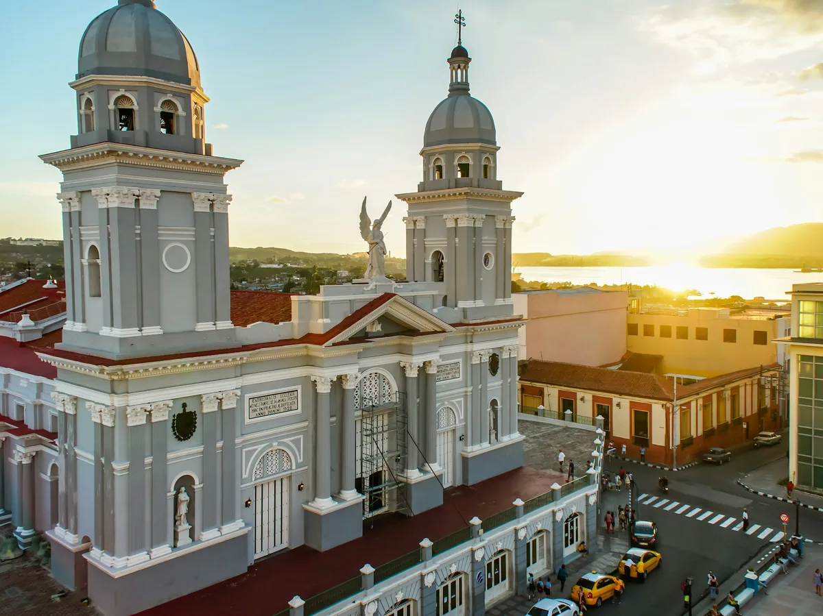 Santiago de Cuba's twin-towered cathedral at sunset, overlooking the bay
