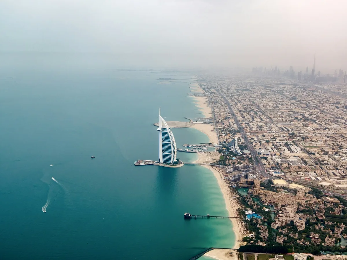 Aerial view of the Burj Al Arab from the sea in Dubai