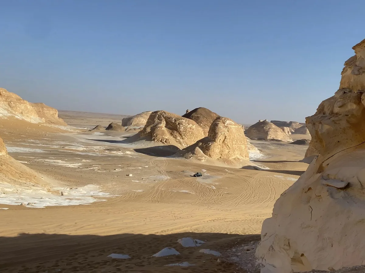 Chalk rock formations in Egypt's White Desert at sunset