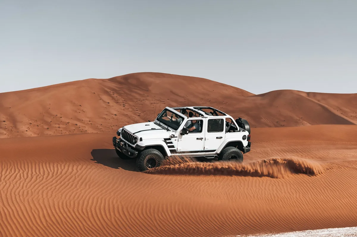 Dubai Desert Safari with Camel Ride & Sandboarding — photo 2