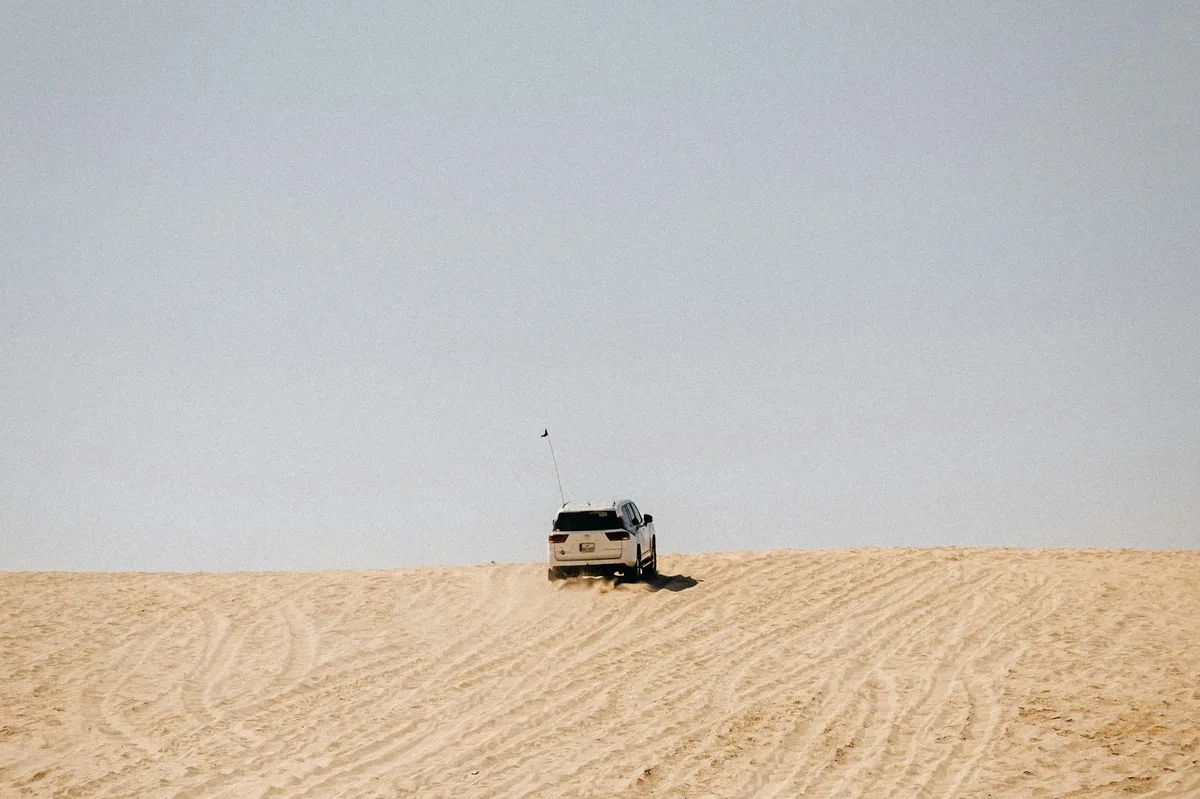 Dubai Desert Safari with Camel Ride & Sandboarding — photo 5
