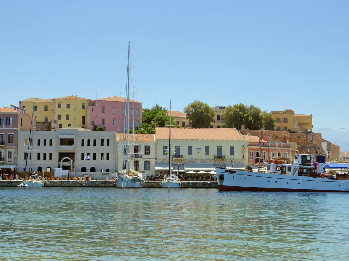Boats moored in the historic Venetian Harbour of Chania, Crete