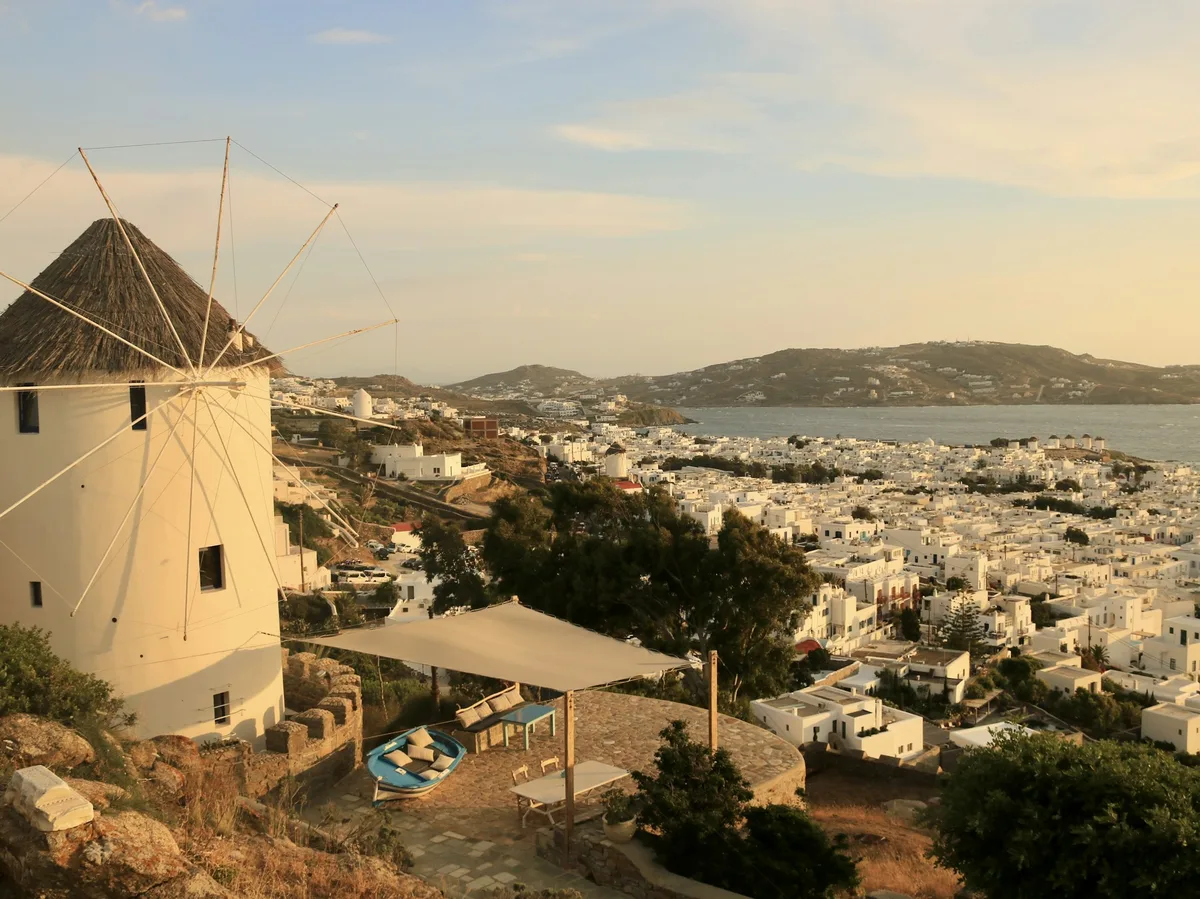 The iconic windmills overlooking Mykonos Town, Greece