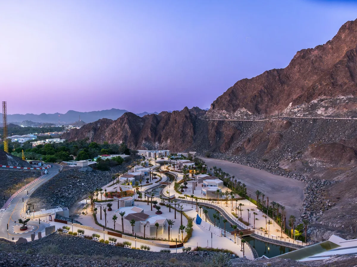Emerald-green Hatta Dam lake surrounded by rugged mountain peaks