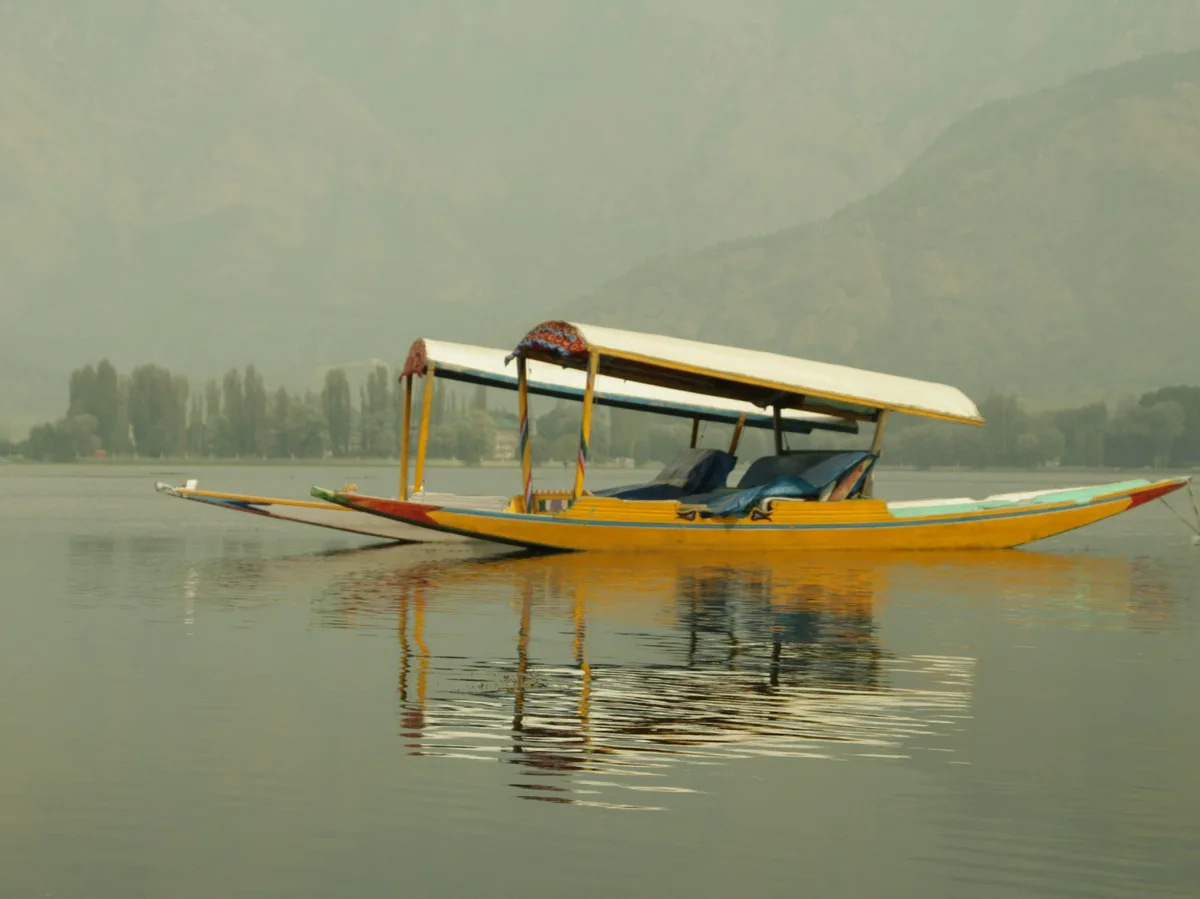 A traditional shikara boat on Dal Lake in Kashmir
