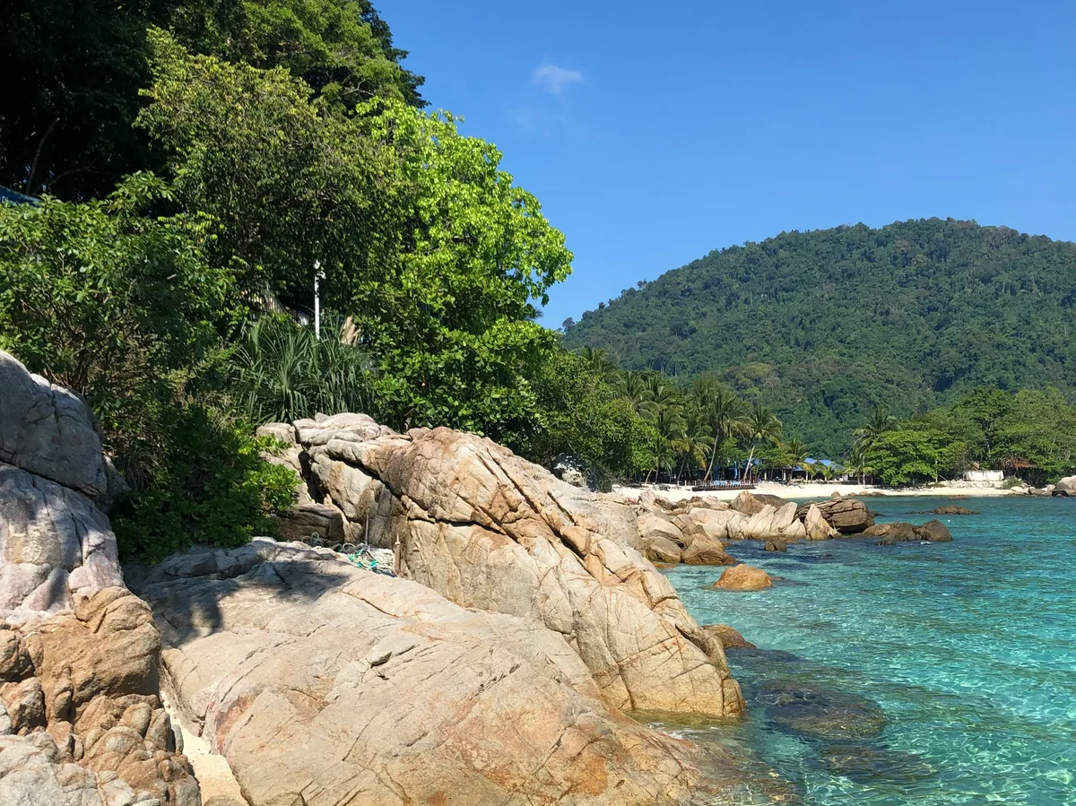 A rocky, palm-fringed islet off the Perhentian Islands, Terengganu, Malaysia