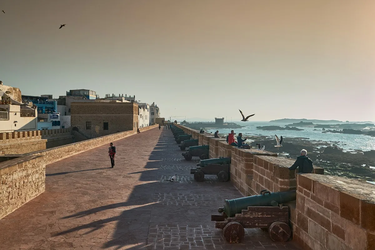 The seafront ramparts of Essaouira, Morocco, at sunset
