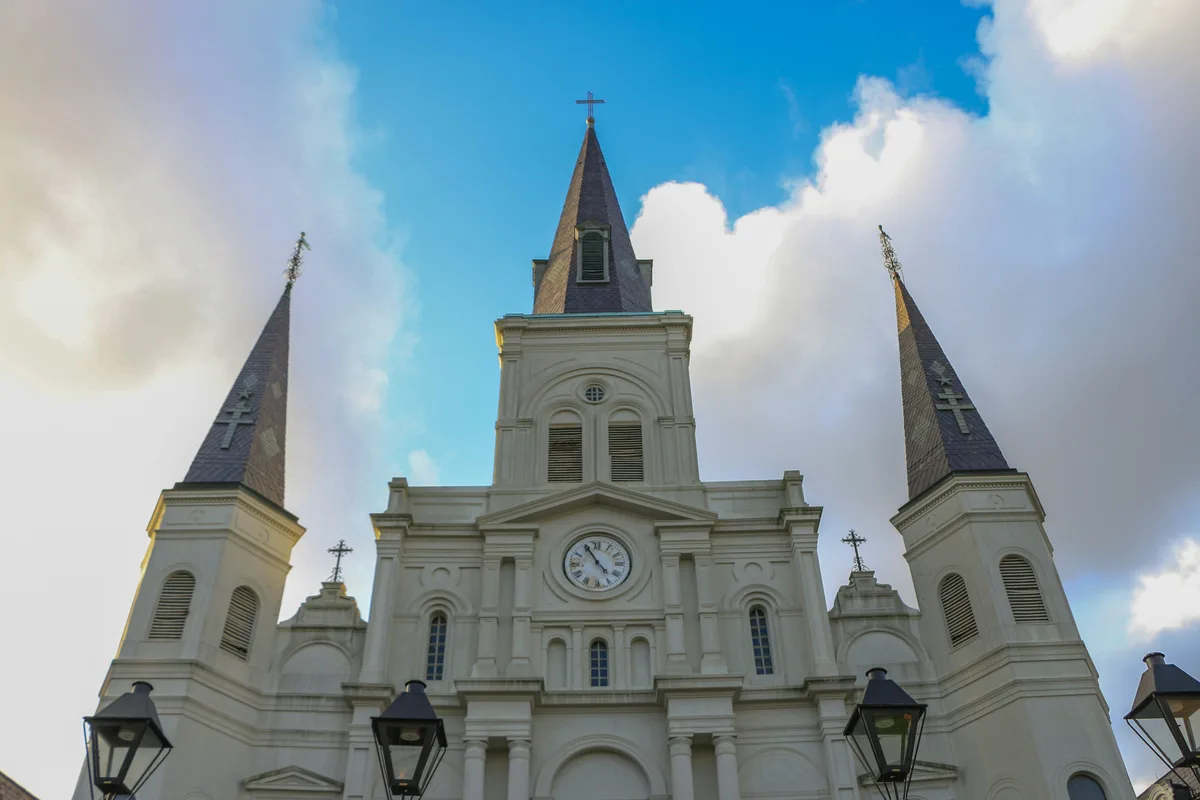 St. Louis Cathedral's triple spires rising over the French Quarter, New Orleans