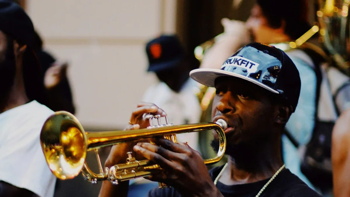 A brass band performing on a French Quarter street corner