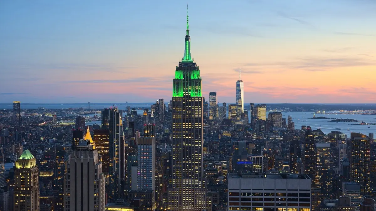 The Empire State Building and Manhattan skyline at sunset