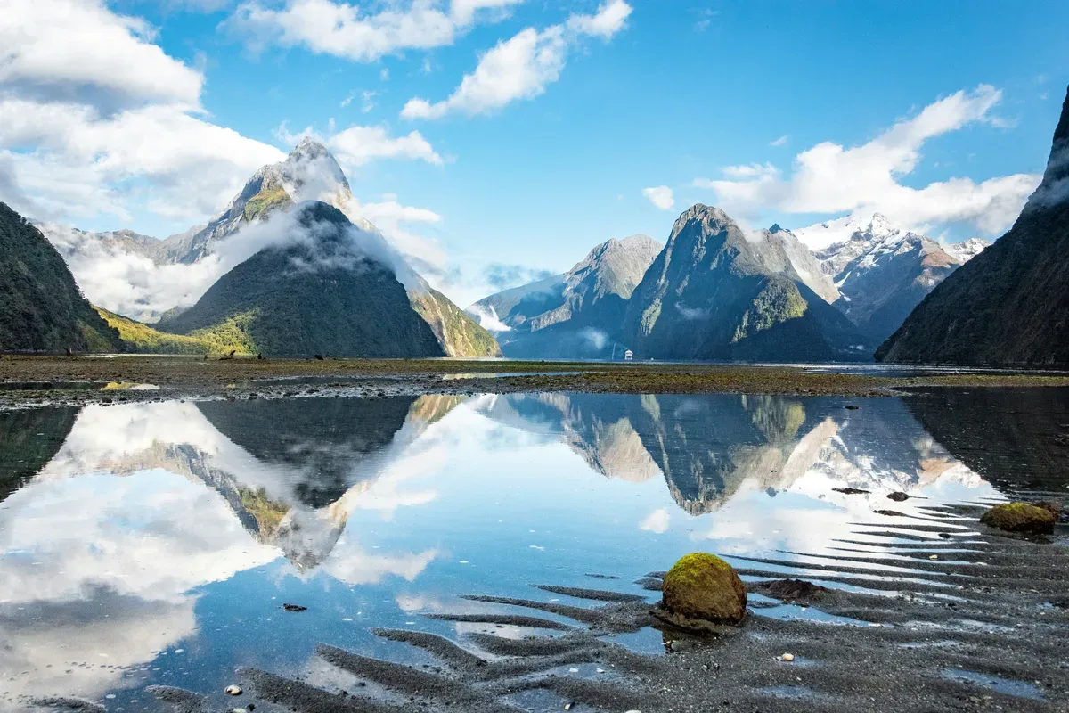 Fox Glacier flowing down toward rainforest on New Zealand's South Island