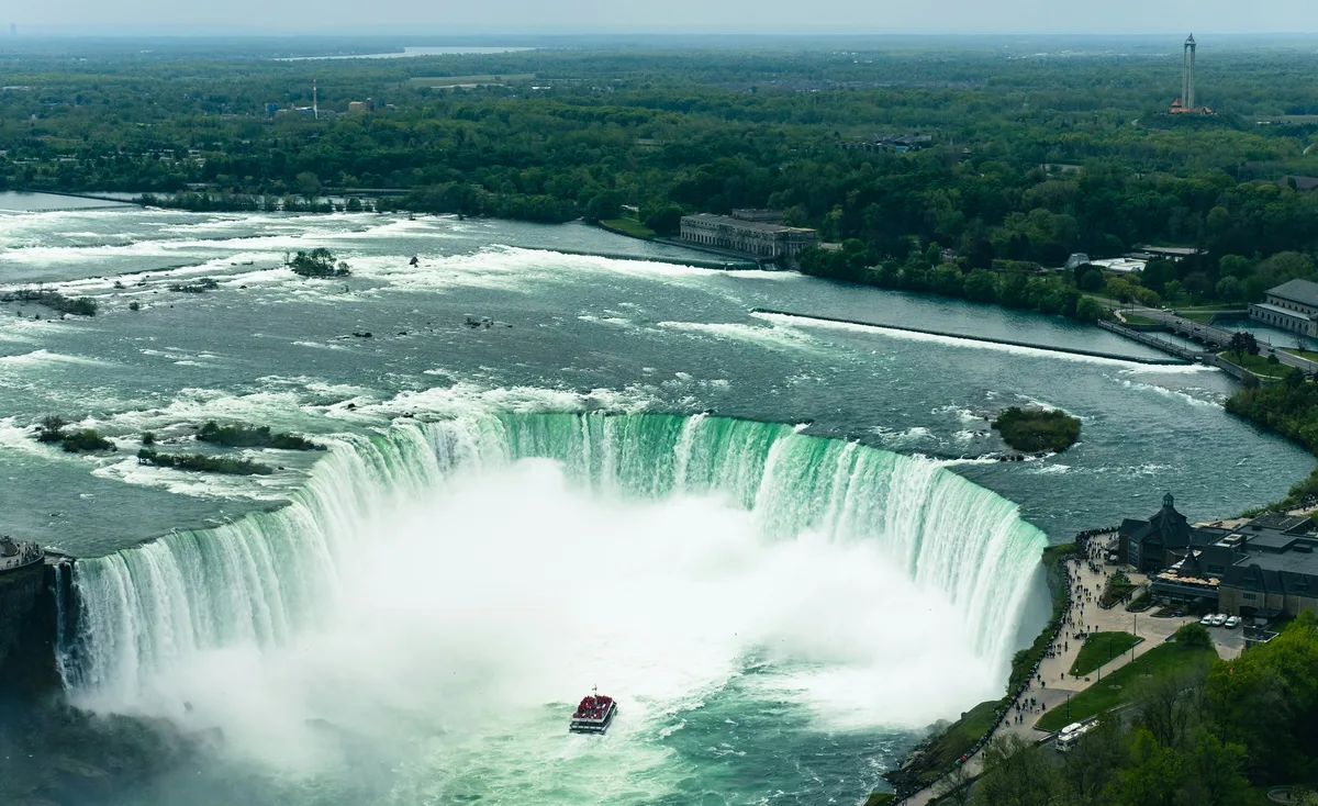 Aerial view of Horseshoe Falls with a sightseeing boat below