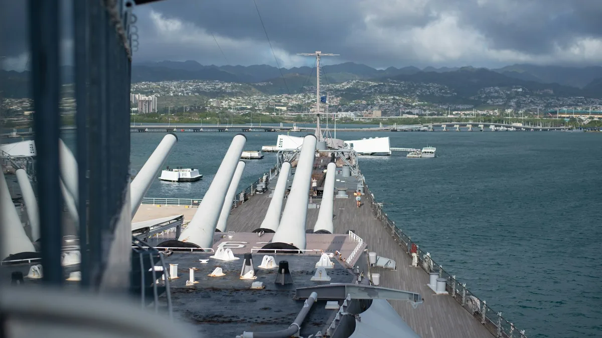 Battleship gun turrets on the deck of the USS Missouri overlooking Pearl Harbor
