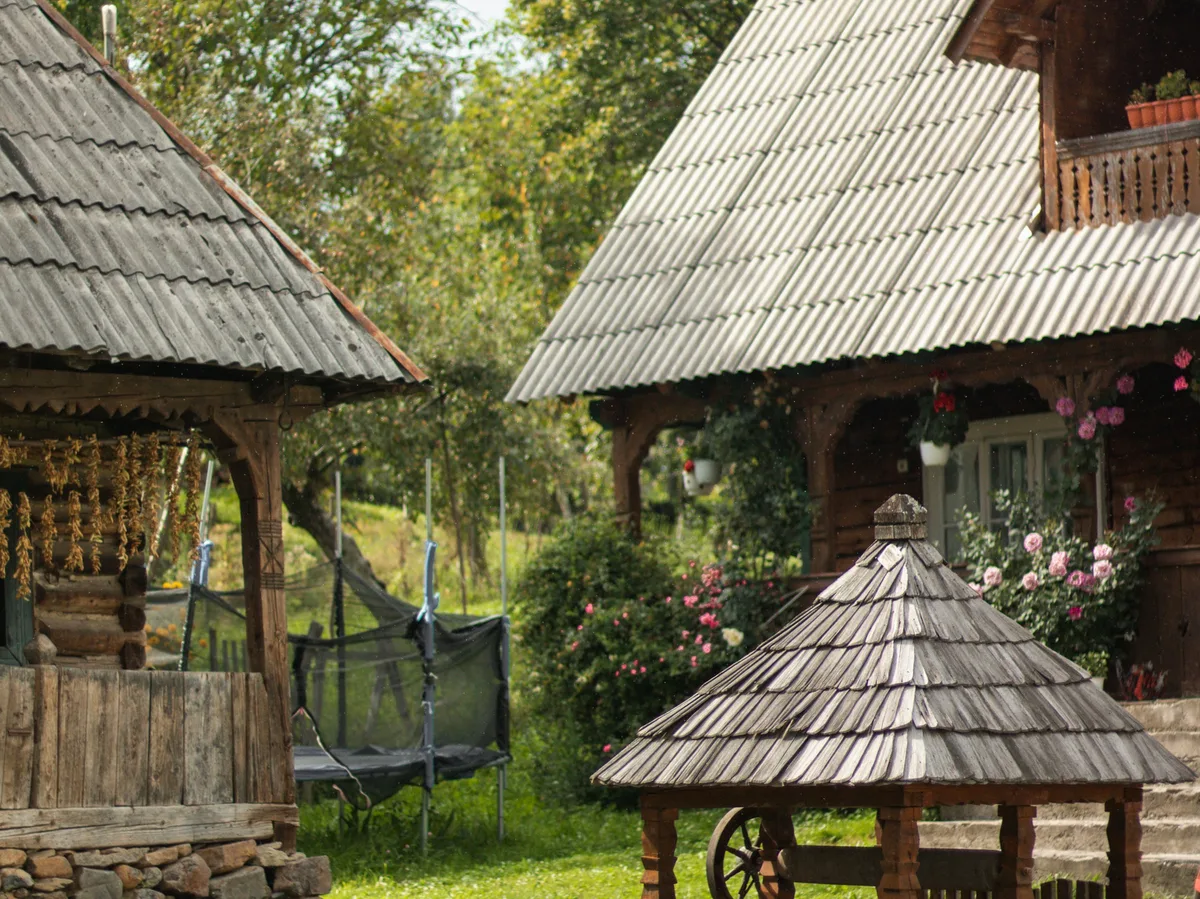 A traditional tall wooden church in the Maramureș region of Romania