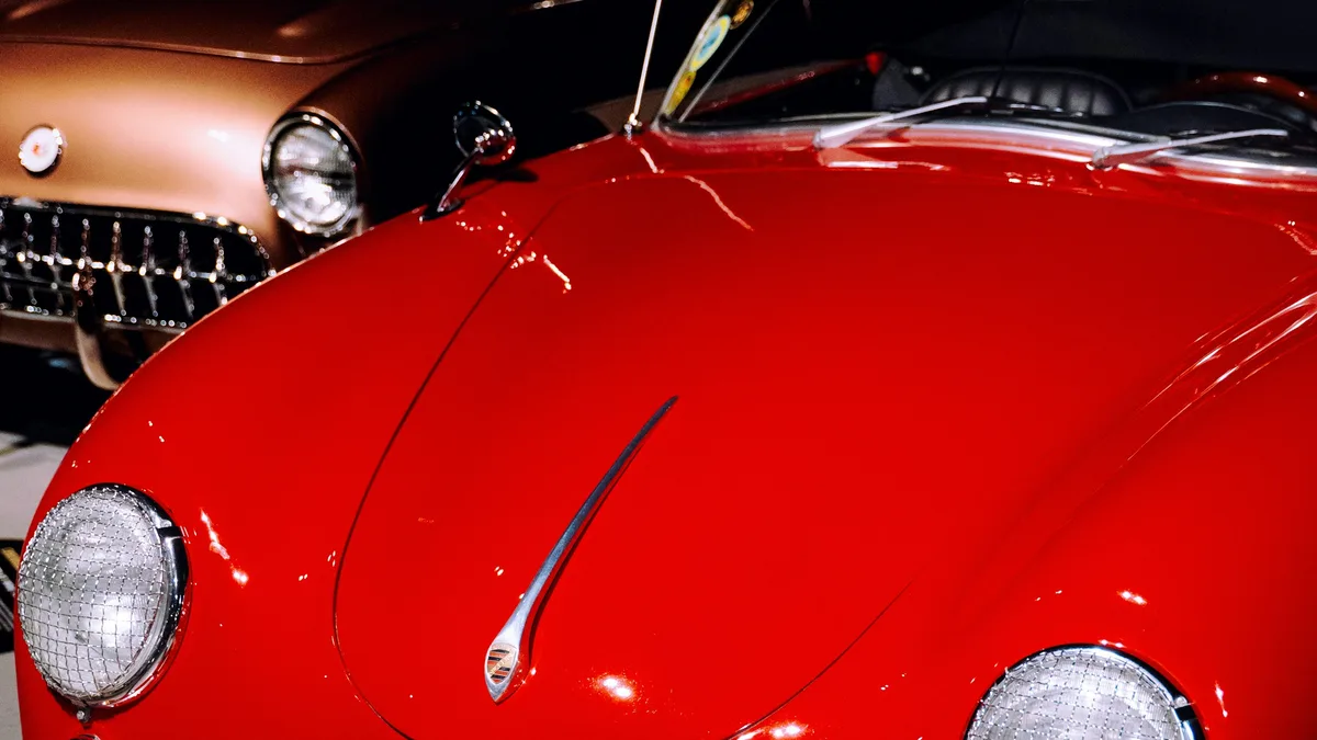 Classic cars on display inside an automobile museum