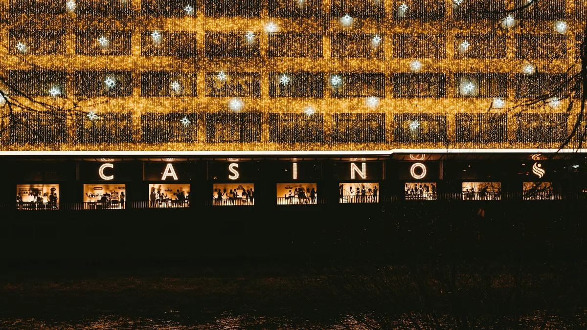 A luxury casino resort illuminated at night