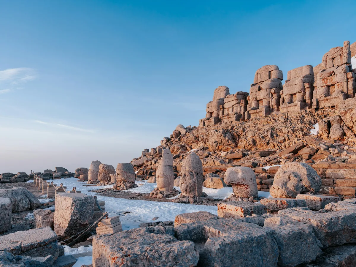 Ancient stone head statues atop Mount Nemrut in Adıyaman, Turkey