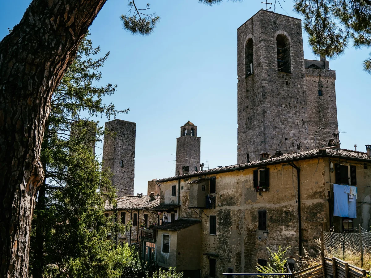 The medieval towers of San Gimignano rising above the Tuscan countryside