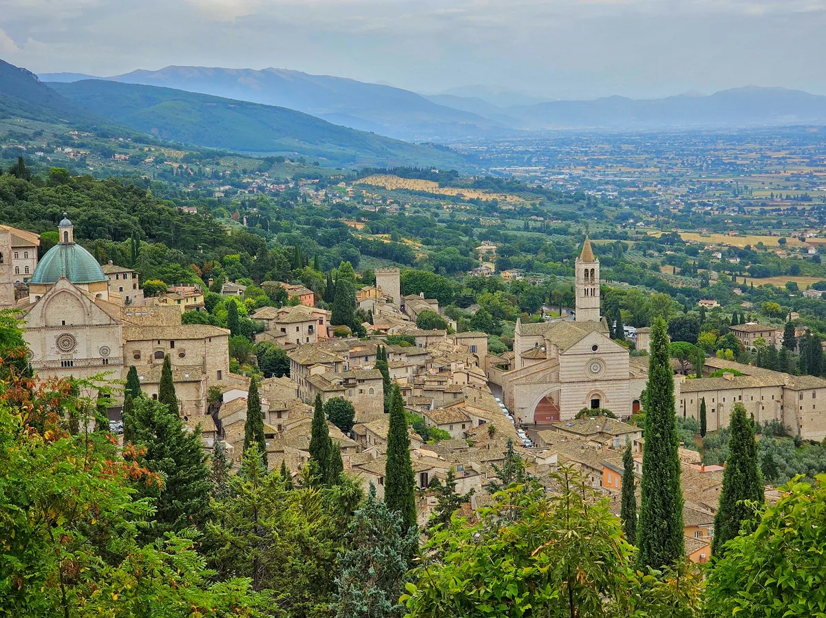 The hilltop town of Assisi in Umbria seen from below