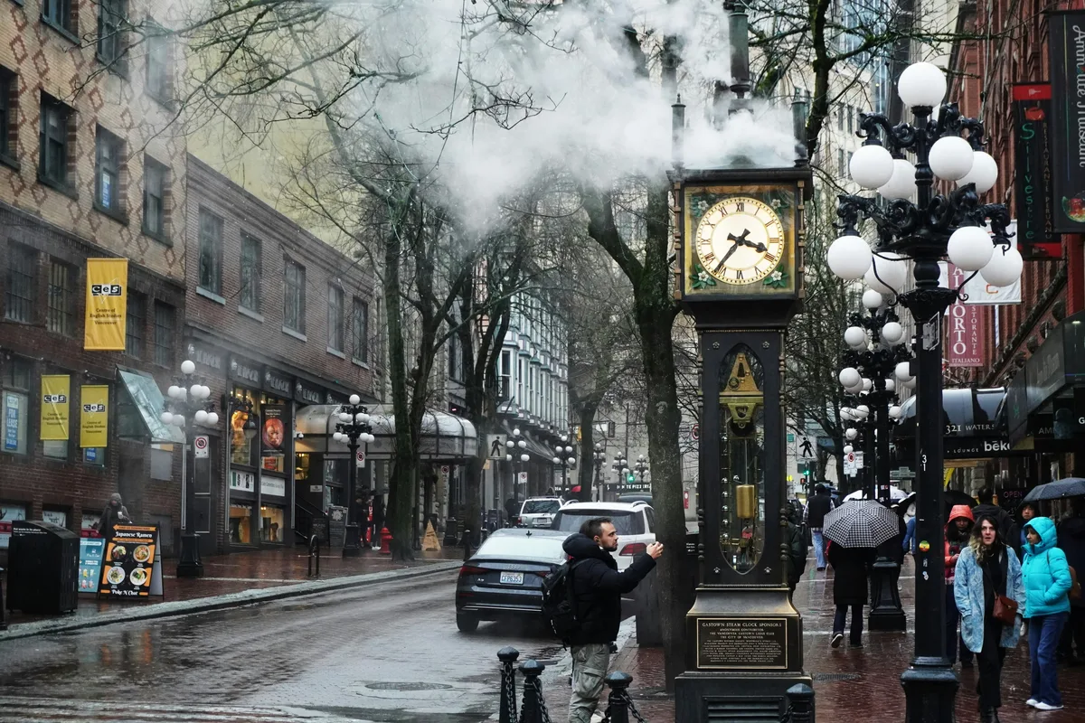 Steam rising from the Gastown Steam Clock on a Vancouver street corner